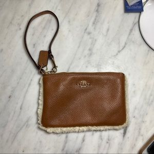 COACH WRISTLET BROWN LEATHER WITH SHEARLING TRIM